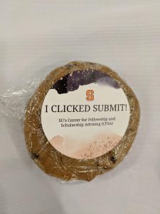 cookie wrapped in plastic with a sticker on it that reads "I clicked submit"