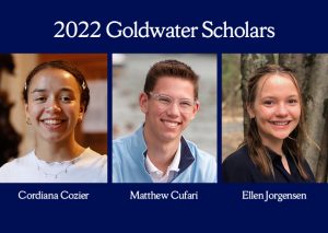 Blue rectangle with white text that reads "2022 Goldwater Scholars at the top", then below from left to right a picture of Cordiana Cozier (a young, brown skinned woman smiling), Matt Cufari (a young white man with glasses and short, trim brown hair smiling) and Ellen Jorgensen (a young woman with long dark blonde hair smiling)