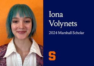 A woman smiles in a headshot. She has blue hair and is wearing a white collared shirt. On the right of her photo is a blue background with the words Iona Volynets 2024 Marshall Scholar.